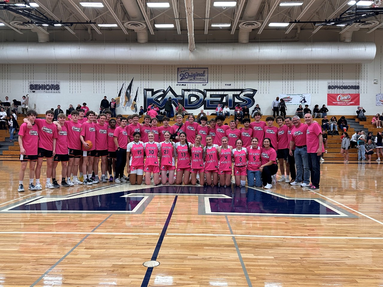 Group shot of basketball teams in pink